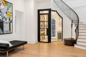 WIne-room-under-a-set-of-stairs-by-Stately